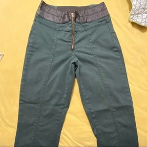 Military green BEBE jeans.